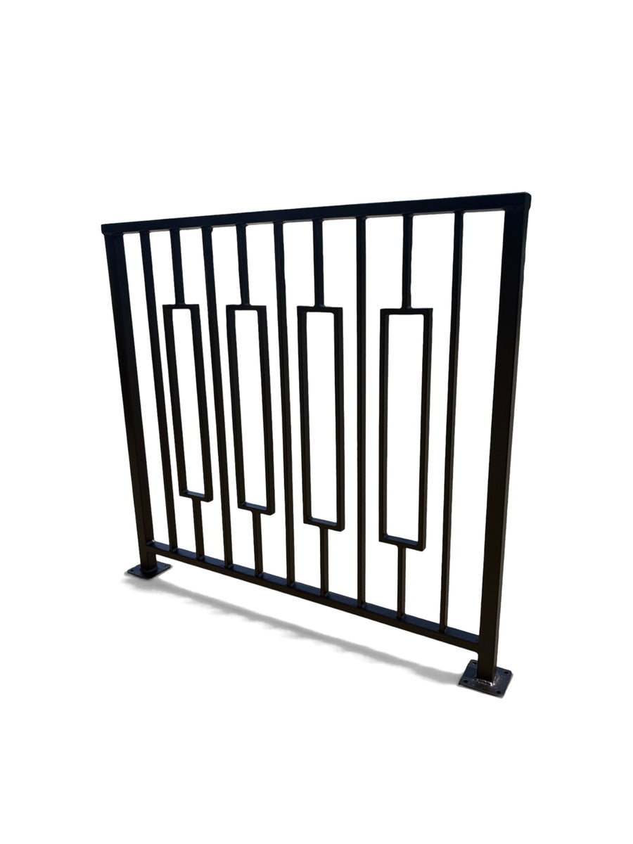 Keystone framed steel railing panel at an angle showing the floating frames standing proud of the pickets, matte black powder coat