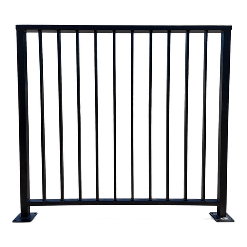 Axis vertical bar railing panel in matte black powder coated steel — custom welded guardrail with flat top cap rail and bolt-down base plates, made to size in New Jersey